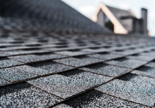 Asphalt shingle roofing with textured granules for weather resistance.
